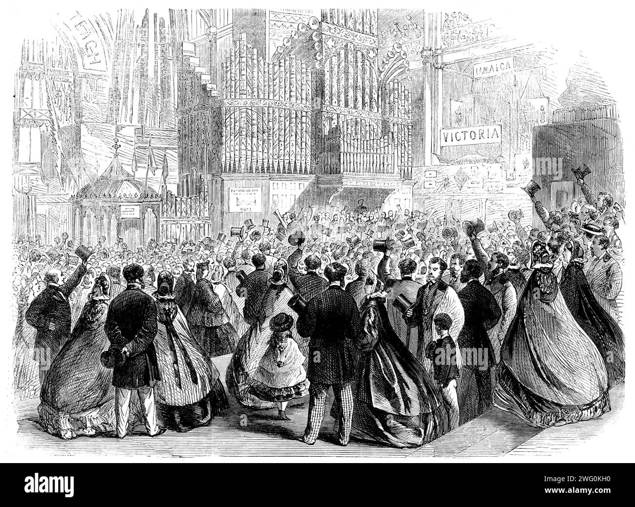 The International Exhibition: a scene near the Eastern Dome on the closing day, 1862. 'Whether from accident or with a design to draw off some of the human pressure from the western portion of the building, some little time before four o'clock, the hour appointed for the closing, a large number of persons were attracted towards the eastern dome by the appearance of Messrs. Distins' band, which took up a position beneath Foster and Andrews' large organ, which stood in the north-eastern transept close to the steps leading to the platform of the dome. The strains of &quot;God Save the Queen&quot; Stock Photo