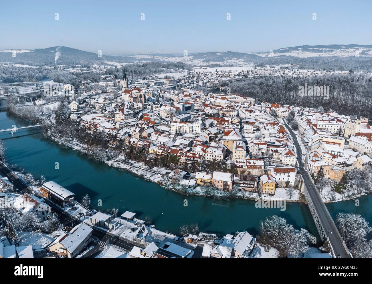 Beautiful winter cityscape with Krka river flowing through city of Novo mesto, Slovenia Stock Photo
