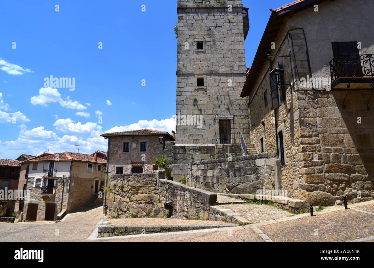 Miranda del Castañar, stone houses and bell tower. Salamanca province, Castilla y Leon, Spain. Stock Photo