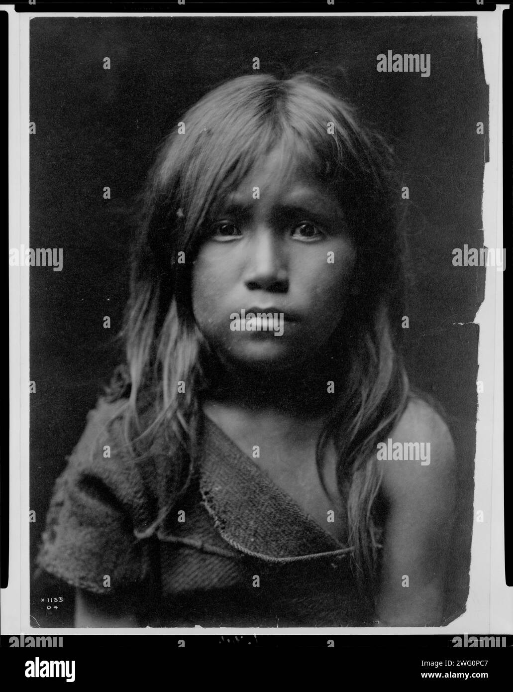 Hopi Angel, c1905. Photo shows a Hopi girl, head-and-shoulders portrait, facing front. Stock Photo