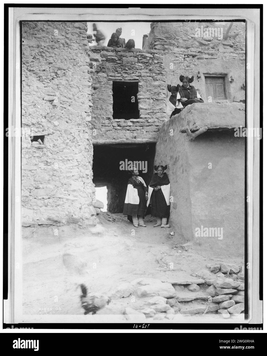 Good morning-Hopi, c1906. Pueblo building with people. Stock Photo
