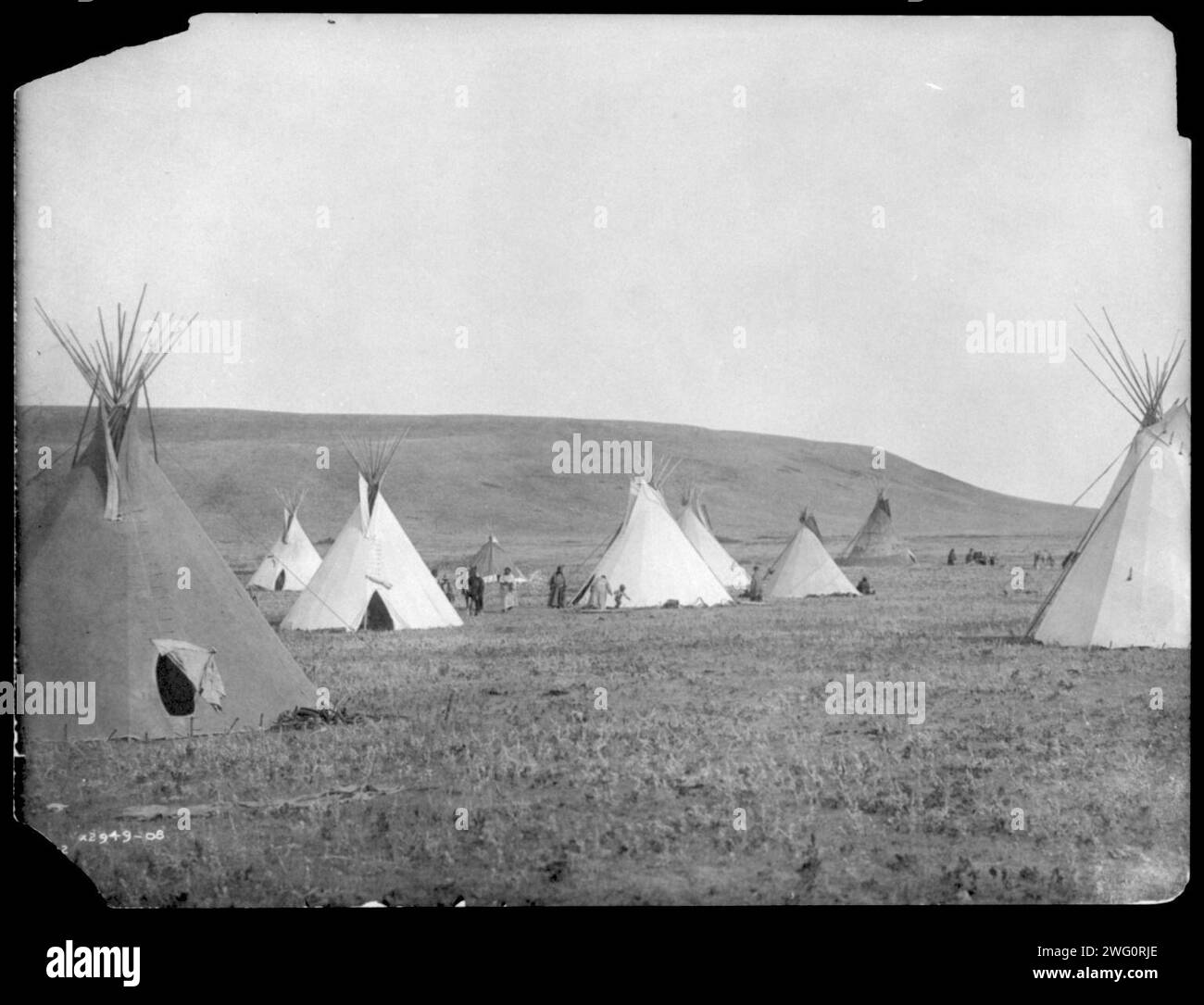 Atsina camp scene, c1908. Tipis on plains. Stock Photo