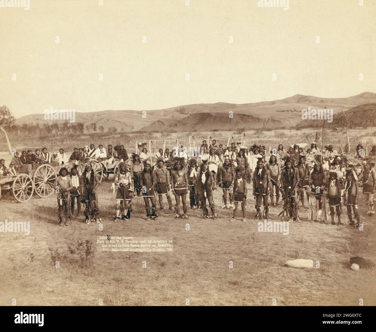 At the dance. Part of the 8th U.S. Cavalry and 3rd Infantry at the great Indian grass dance on reservation []. Group portrait of Big Foot's (Miniconjou) band at a grass dance on the Cheyenne River, S.D. on or near Cheyenne River Indian Reservation. Stock Photo