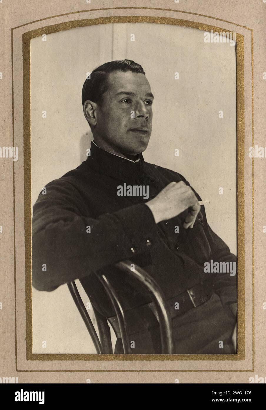 A young man in a military jacket, probably the son of A.F. Domishkevich, late 19th cent - early 20th cent. This collection of photographs and documents from the private archive of Sergei Mikhailovich Chashchin relates to the establishment of a firefighting service in eastern Siberia in the nineteenth and early twentieth centuries. It includes materials about early firefighting equipment, the organization of a Siberian firefighting team, and the leaders of Siberia's first firefighting service. Stock Photo