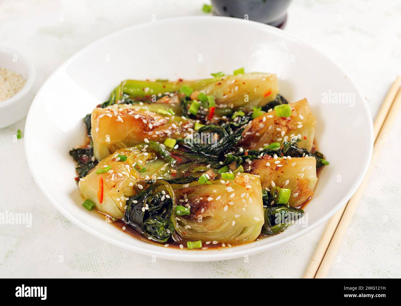 Homemade asian sauteed soy bok choy with sesame seeds. Stir fry pak