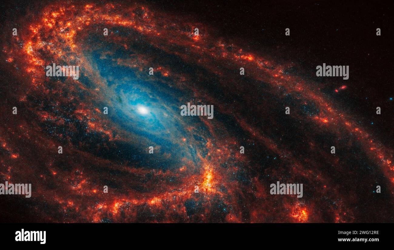 Face-on spiral galaxy, NGC 3627. Bright orange, red blue, black hole galactic long-range captured image. Elements of this image furnished by NASA (obs Stock Photo