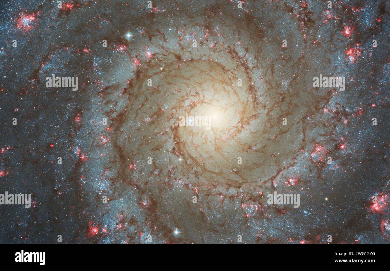 Face-on spiral galaxy, NGC 628. Bright galactic long-range captured imagery. Elements of this image furnished by NASA (observed by the Hubble telescop Stock Photo