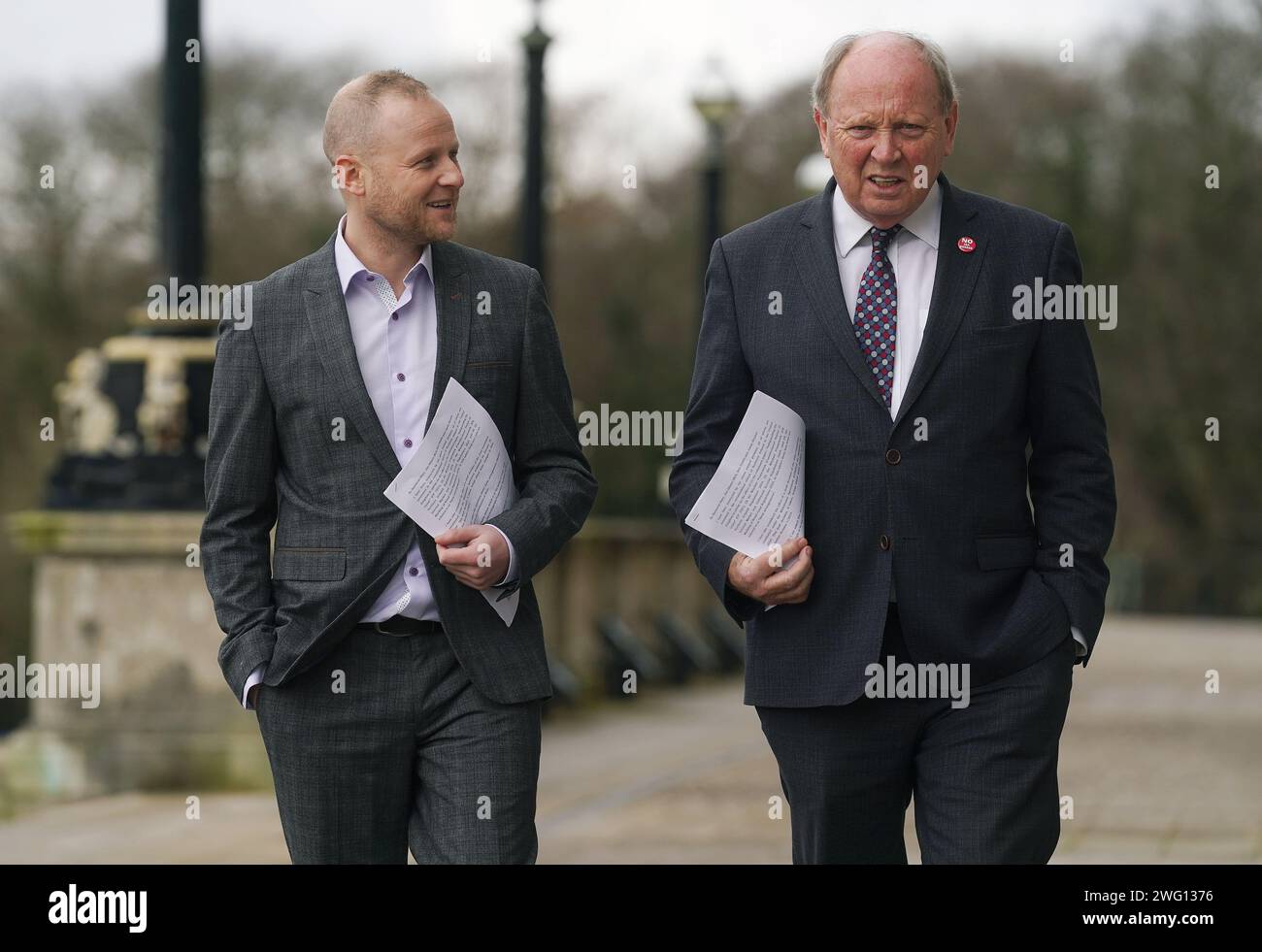 Loyalist activist Jamie Bryson (left) and TUV leader Jim Allister on the steps of Stormont in Belfast after unionist opponents of the Government deal published legal advice, as political parties are to meet ahead of the return of the Northern Ireland Executive. Picture date: Friday February 2, 2024. Stock Photo