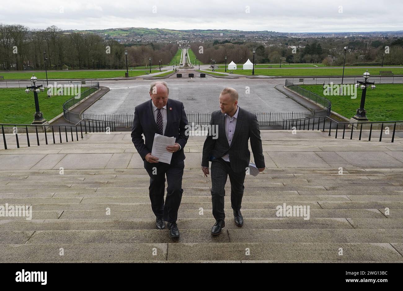 Loyalist activist Jamie Bryson (right) and TUV leader Jim Allister on the steps of Stormont in Belfast after unionist opponents of the Government deal published legal advice, as political parties are to meet ahead of the return of the Northern Ireland Executive. Picture date: Friday February 2, 2024. Stock Photo