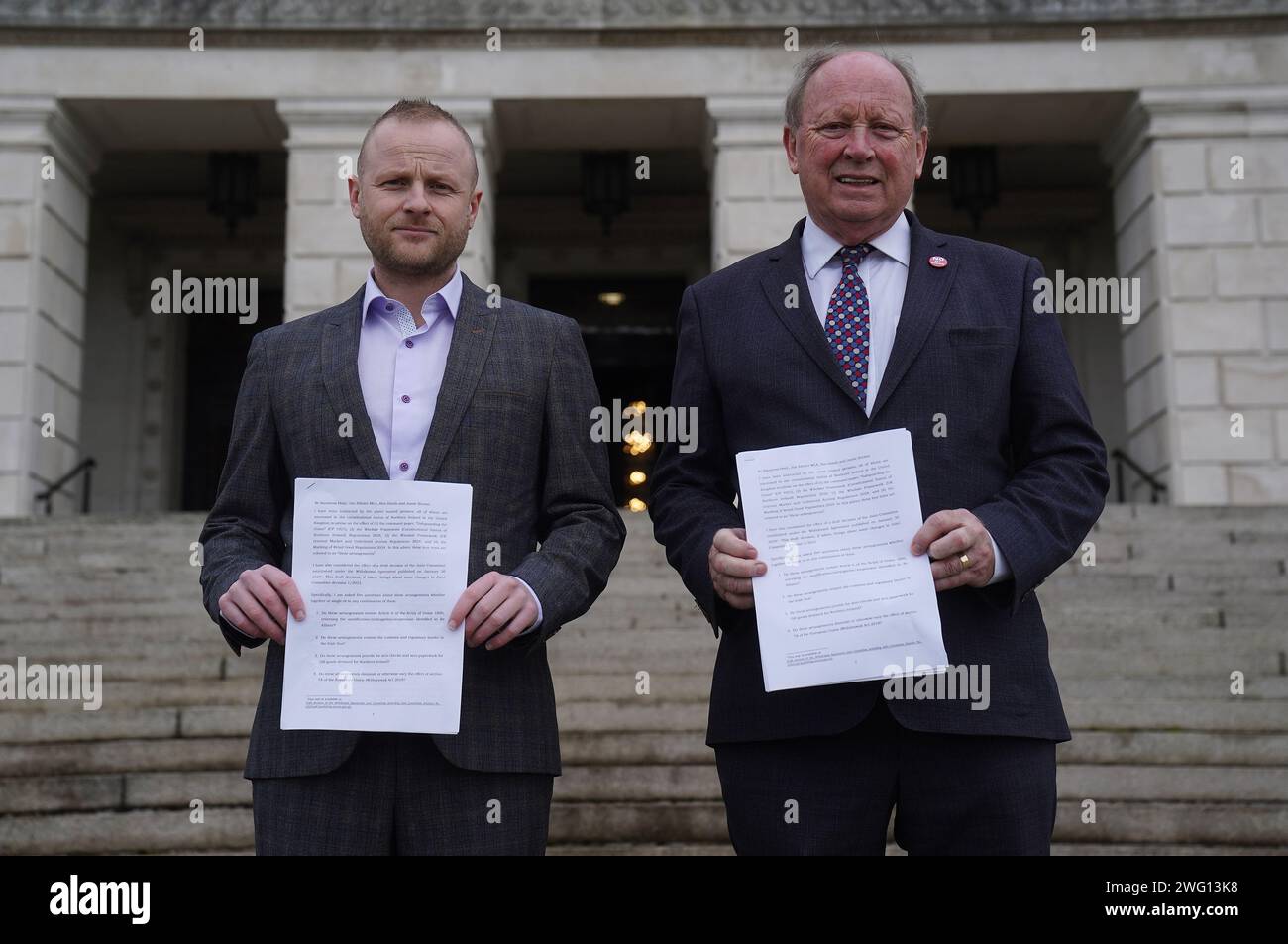 Loyalist activist Jamie Bryson (left) and TUV leader Jim Allister on the steps of Stormont in Belfast after unionist opponents of the Government deal published legal advice, as political parties are to meet ahead of the return of the Northern Ireland Executive. Picture date: Friday February 2, 2024. Stock Photo