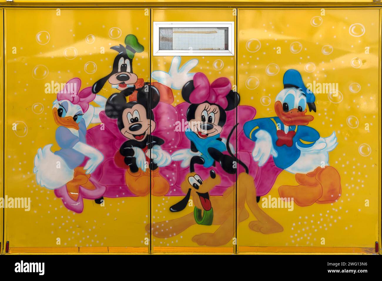 Walt Disney figures on a container wall at the Old Harbour, Genoa, Italy Stock Photo