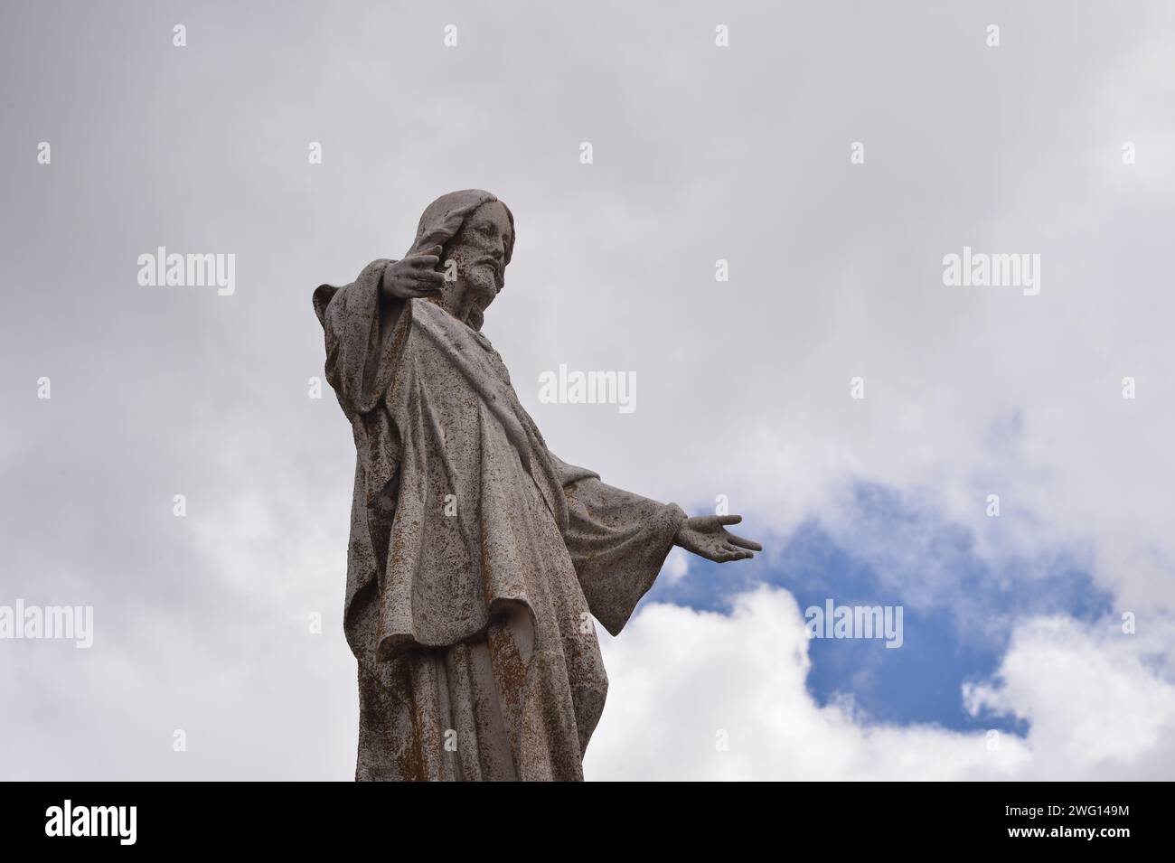 A low angle shot of a statue of Jesus Christ in the small town of Ayllon, Spain Stock Photo