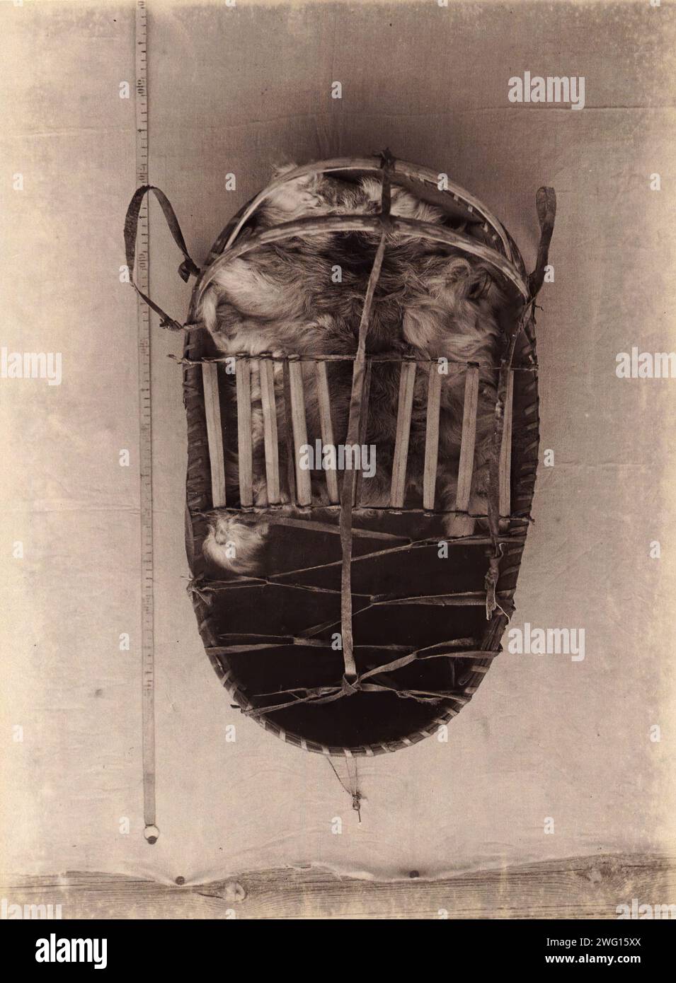 Todzhin Birchbark Cradle (sent to the Berlin Museum fur Volkskunde), 1897. From the album Puteshestviya P. Ye. Ostrovskogo na Yenisey v 1894 i 1897 godakh (The journeys of P. E. Ostrovsky on the Yenisei in 1894 and 1897 which depicts people of the various ethnic groups indigenous to Siberia and the Russian Far East, yurts and smaller cultural objects, Russian fishermen and traders, and natural scenery, especially of the Yenisei River. National Library of Russia Stock Photo