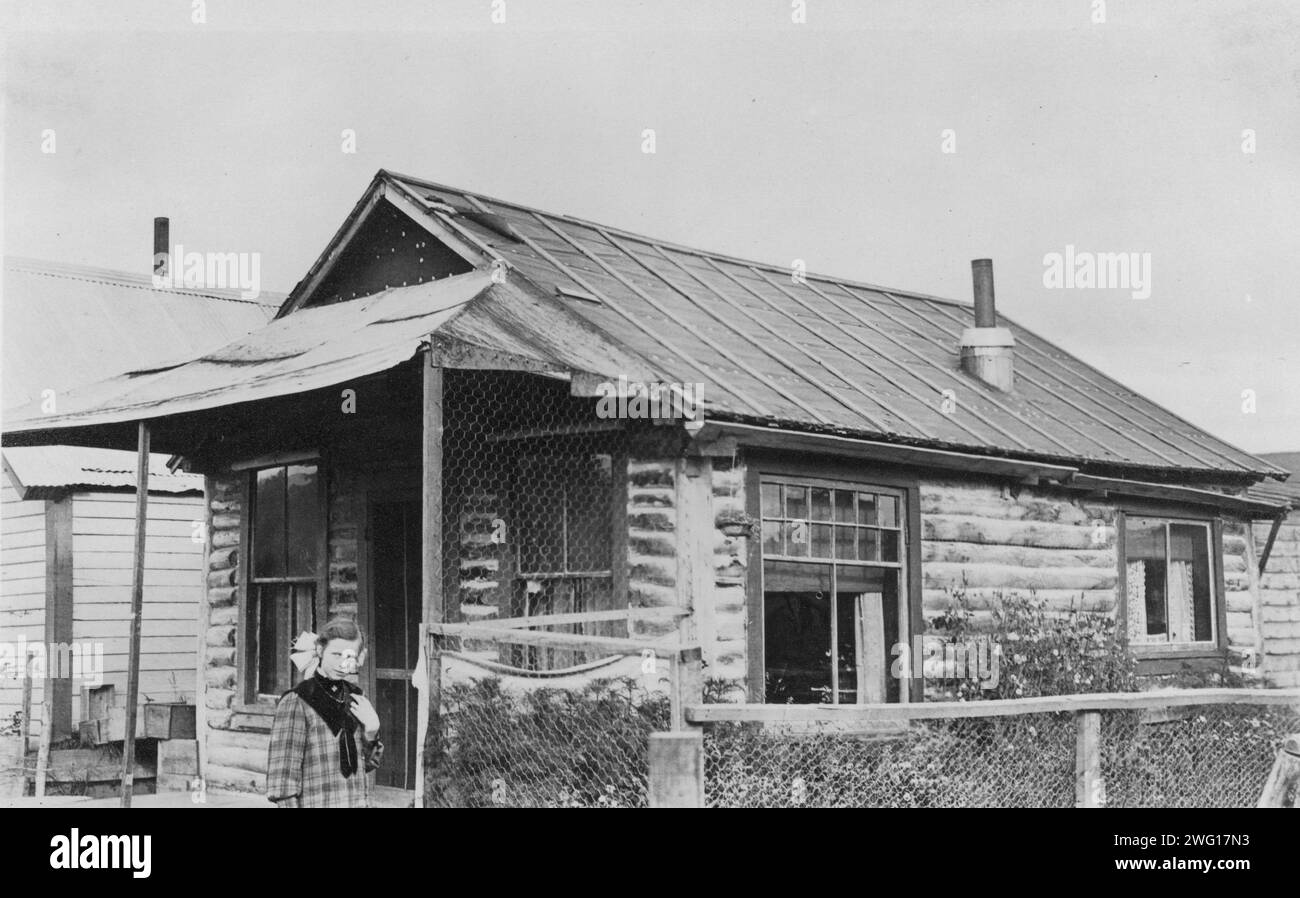 In front of log cabin Black and White Stock Photos & Images - Alamy