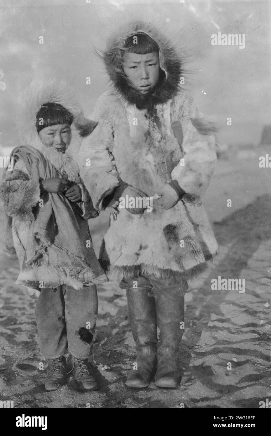 Two eskimo boys Black and White Stock Photos & Images - Alamy
