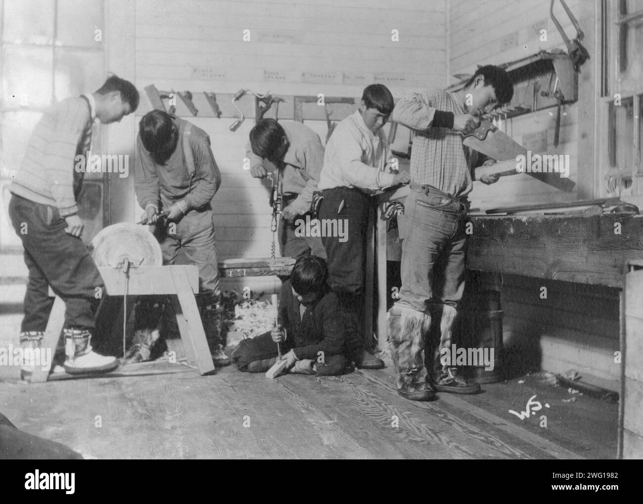Eskimos doing carpenter work, between c1900 and c1930. Stock Photo
