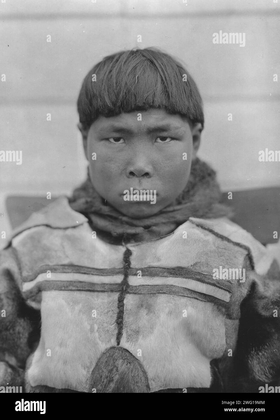 An Alaskan Eskimo boy, between c1900 and c1930 Stock Photo - Alamy