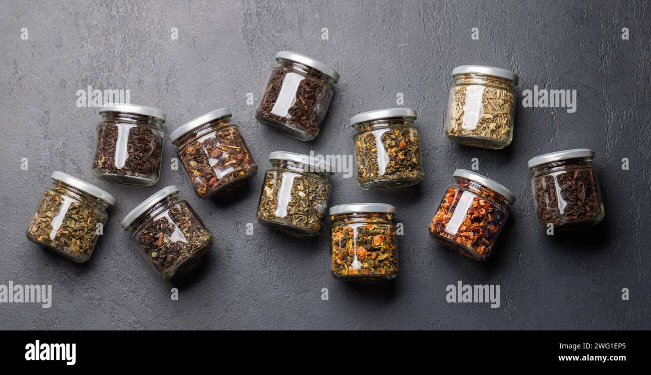 Tea time assortment: Various dry tea leaves. Flat lay Stock Photo