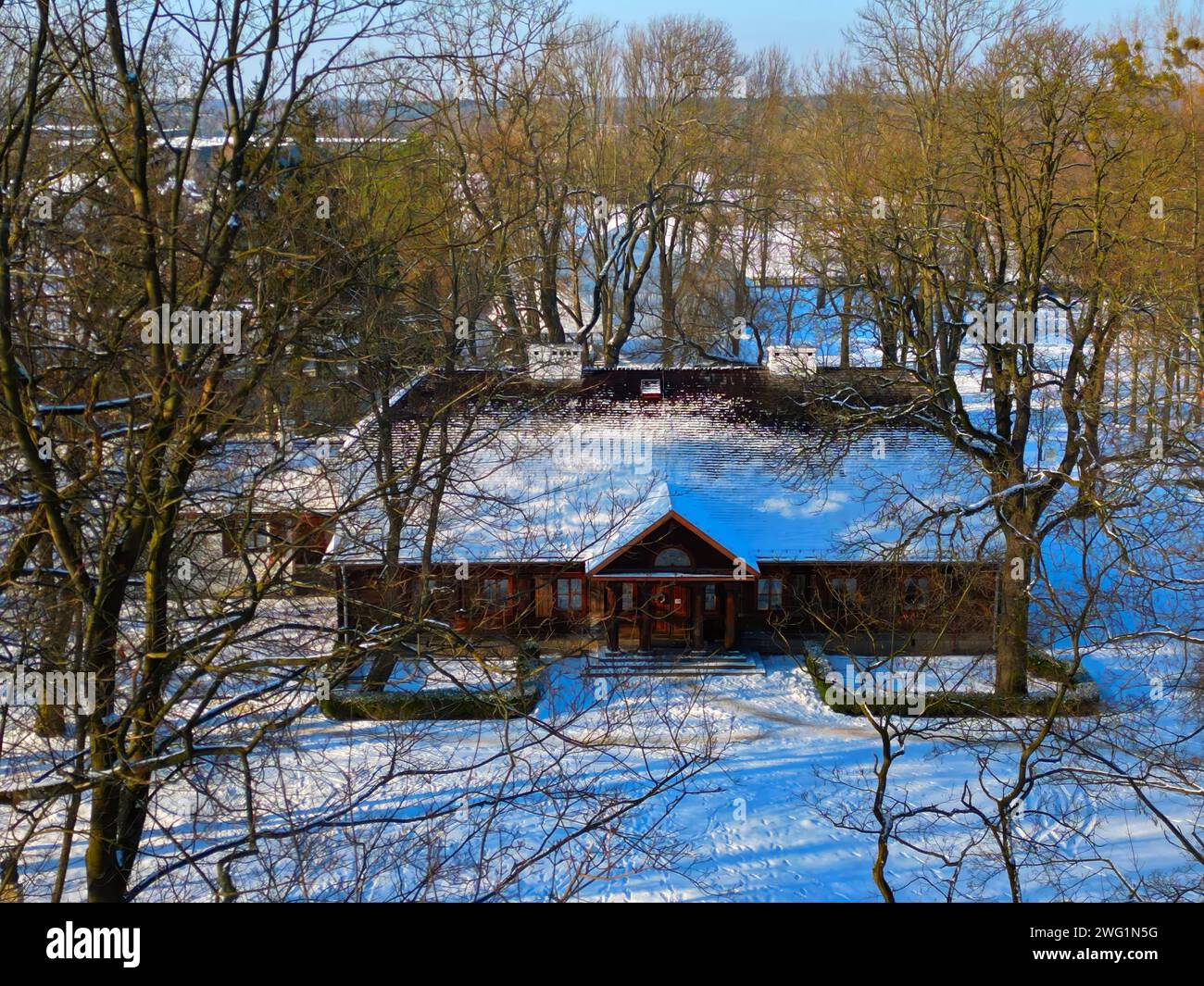 defaultAerial view of Radziejowice Park in winter. The beautiful noble manor house is located in the village of Radziejowice near Warsaw, Poland. Stock Photo