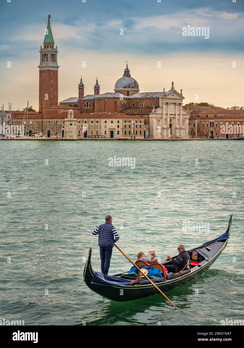 Gondola ride in San Marco Basin in front of San Giorgio Maggiore Church, Venice, Italy Stock Photo