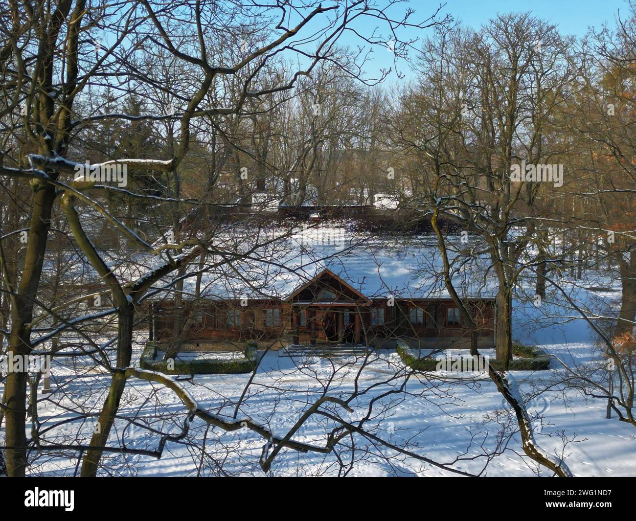 defaultAerial view of Radziejowice Park in winter. The beautiful noble manor house is located in the village of Radziejowice near Warsaw, Poland. Stock Photo