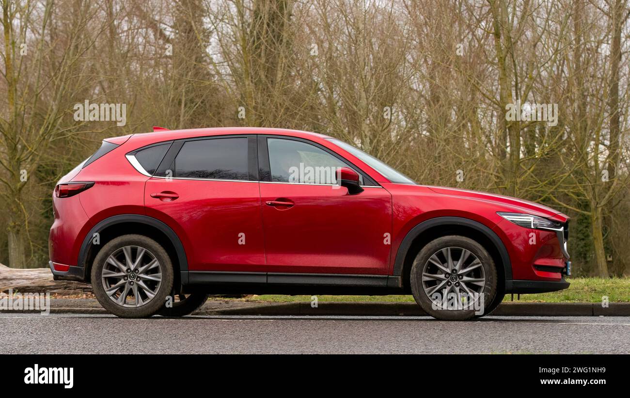 Milton Keynes,UK-Jan 18th 2024: 2020 red Mazda CX-5 car  driving on an English country road. Stock Photo