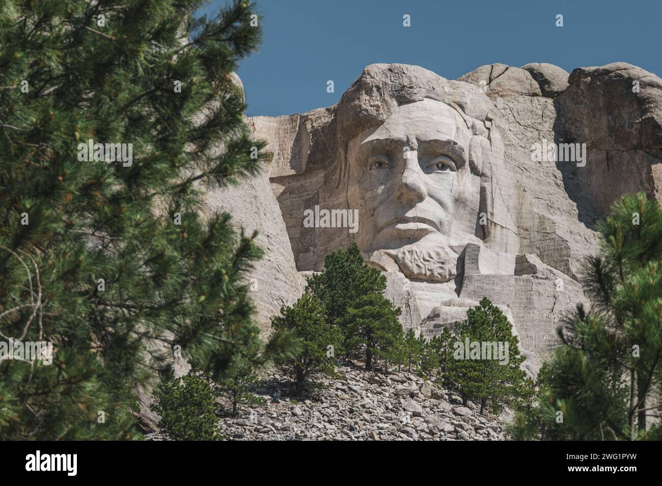 Close-up view of Abraham Lincoln carved into the mountainside at Mt. Rushmore Stock Photo
