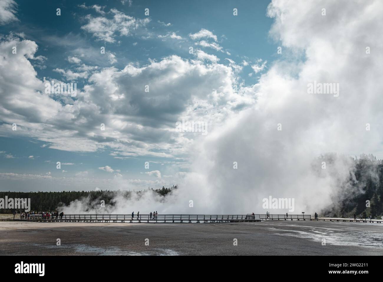 Steam rising from the Excelsior Geyser Crater in Yellowstone National Park Stock Photo