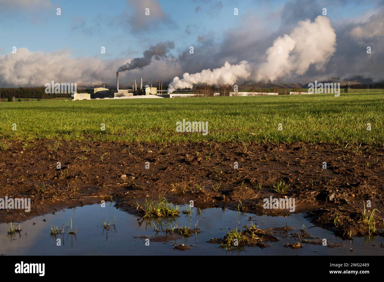 The British Gypsum Works at Kirkby Thore, Cumbria, with snow-capped fells behind. Stock Photo