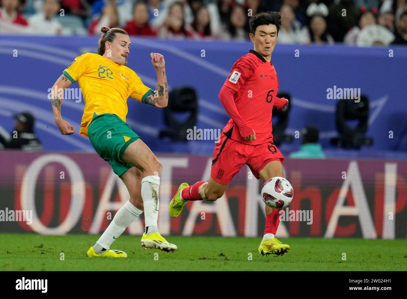 Hwang Rahi Australia's Jackson Irvine, left, and South Korea's Hwang In-beom ...