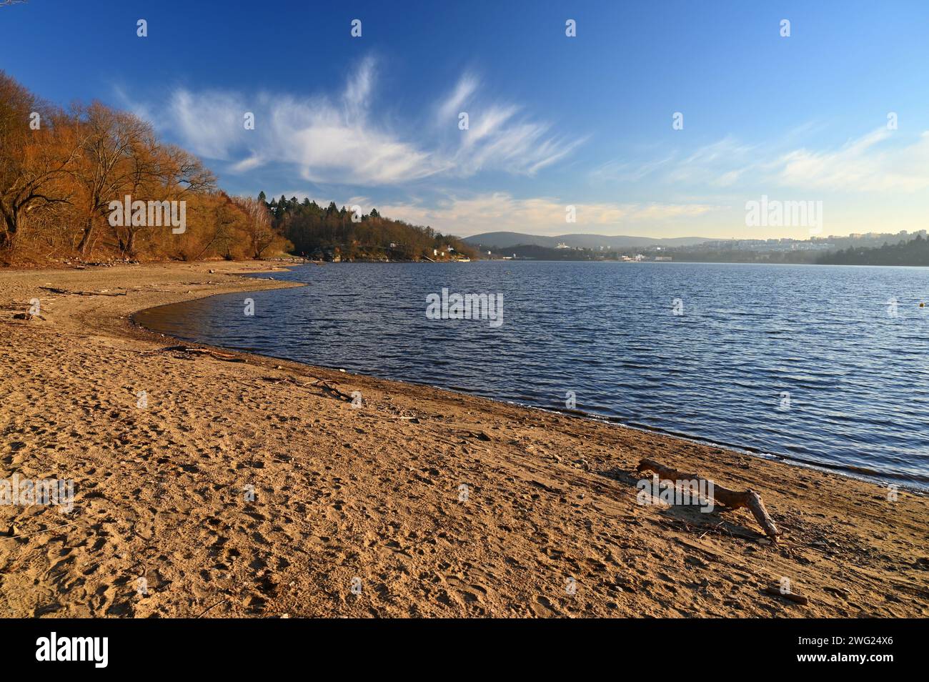Brno Reservoir - City of Brno - Czech Republic - Europe. Beautiful landscape with water and beach. Nice sunny weather with blue sky in winter time. Stock Photo