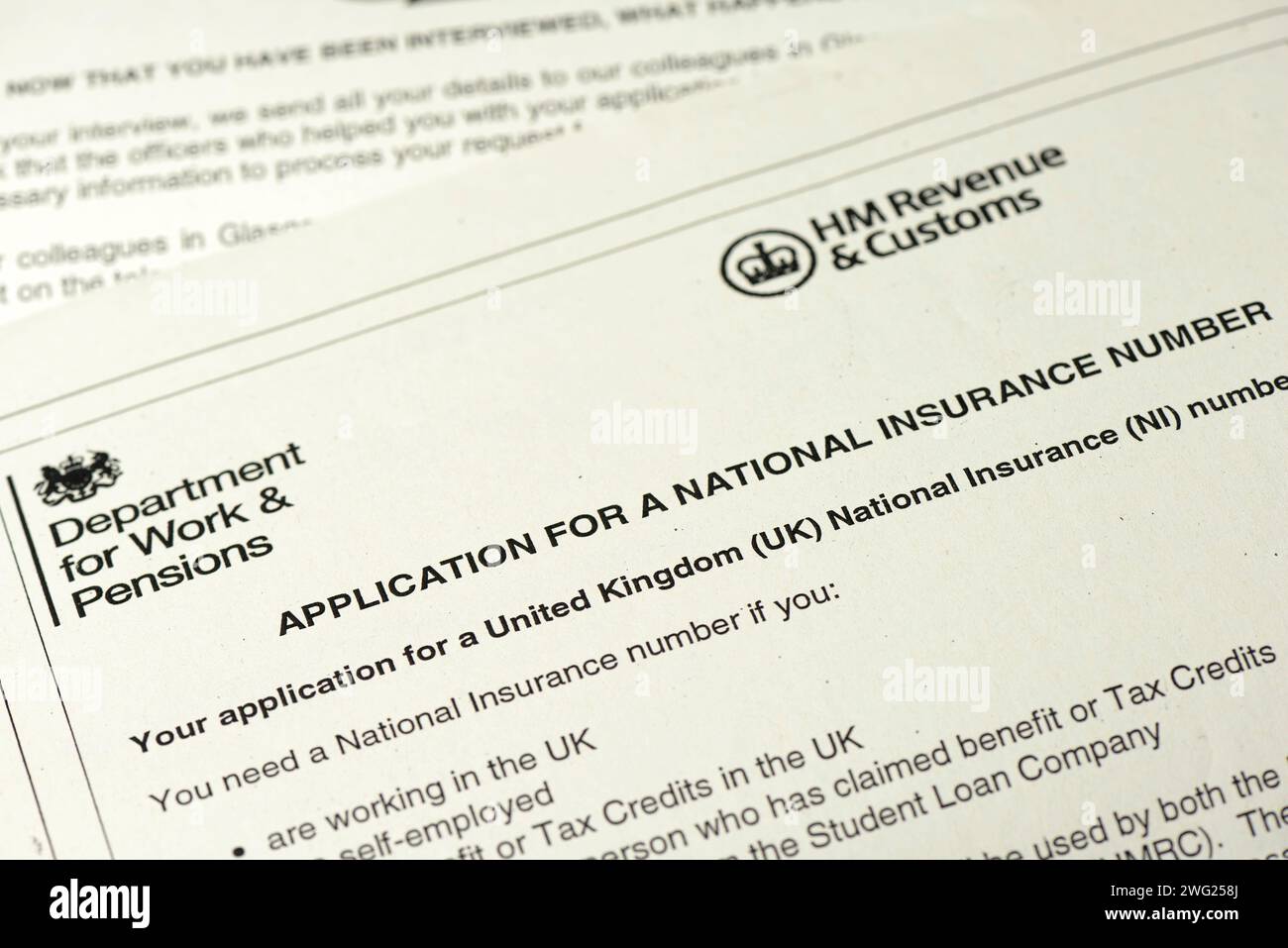 Application for a national insurance number form document by the Department for Work and Pensions in UK issued in 2014 Stock Photo