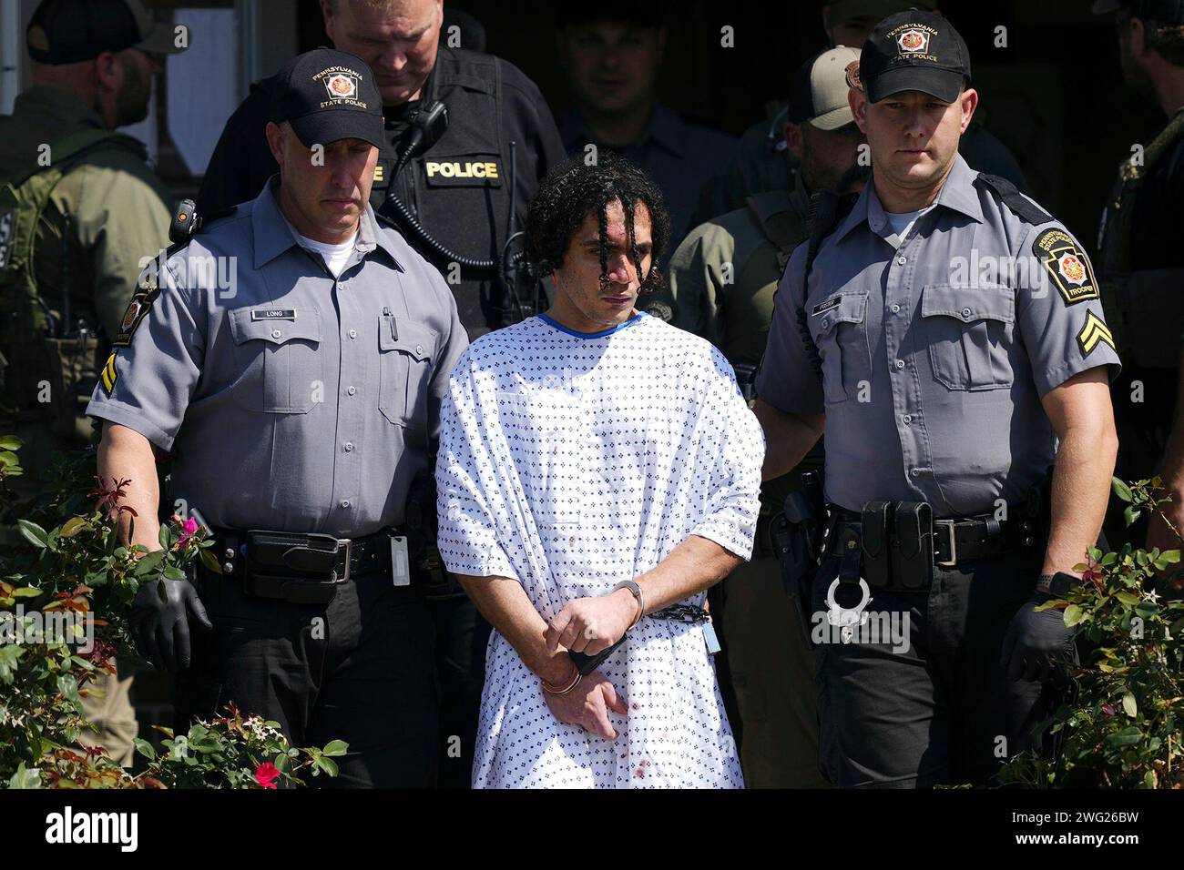 FILE - Law enforcement officers escort Danilo Cavalcante from a ...