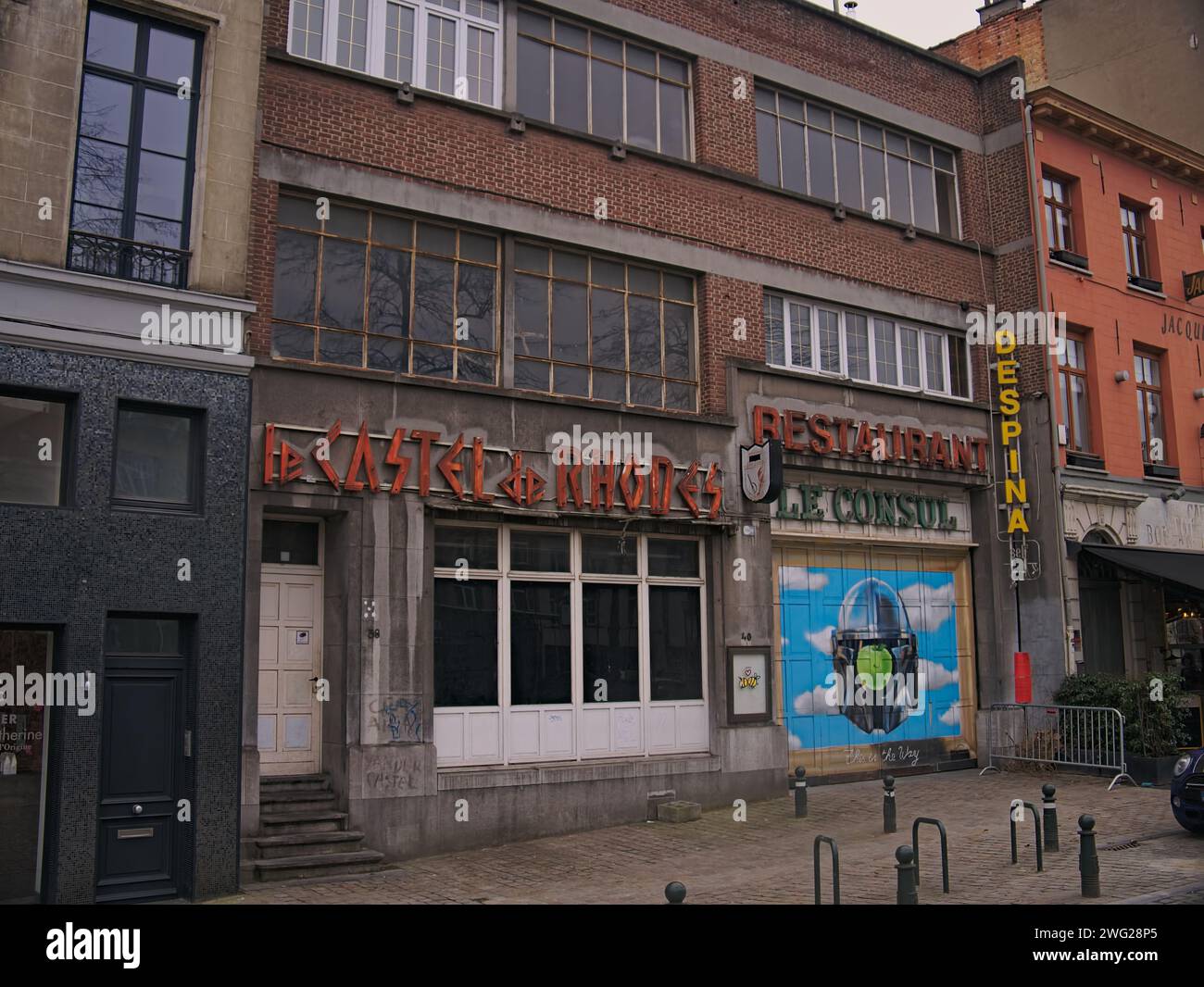 Brussels, Belgium. 2nd Feb, 2024. Two restaurants nearby. Historical places. Building facade. Restaurants Castel de Rhodes and Le Consul. Facade Stock Photo