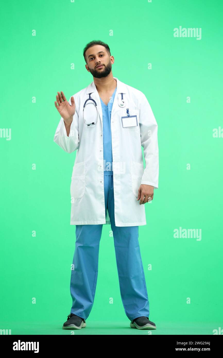 Positive young indian doctor hi-res stock photography and images - Alamy