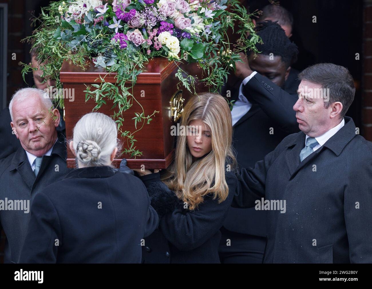 London, UK. 02nd Feb, 2024. Kate Garraway's daughter Darcey, 17, carries the coffin of her father Derek Draper as it leaves The Church of St Mary the Virgin, Primrose Hill in North London following his funeral. Derek Draper, a former political lobbyist and husband of television presenter Kate Garraway, died following a long illness caused by COVI-19 infection. Photo credit: Ben Cawthra/Sipa USA Credit: Sipa USA/Alamy Live News Stock Photo