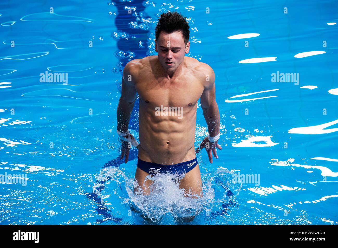 Tom Daley of Great Britain competes in the Mixed team event final
