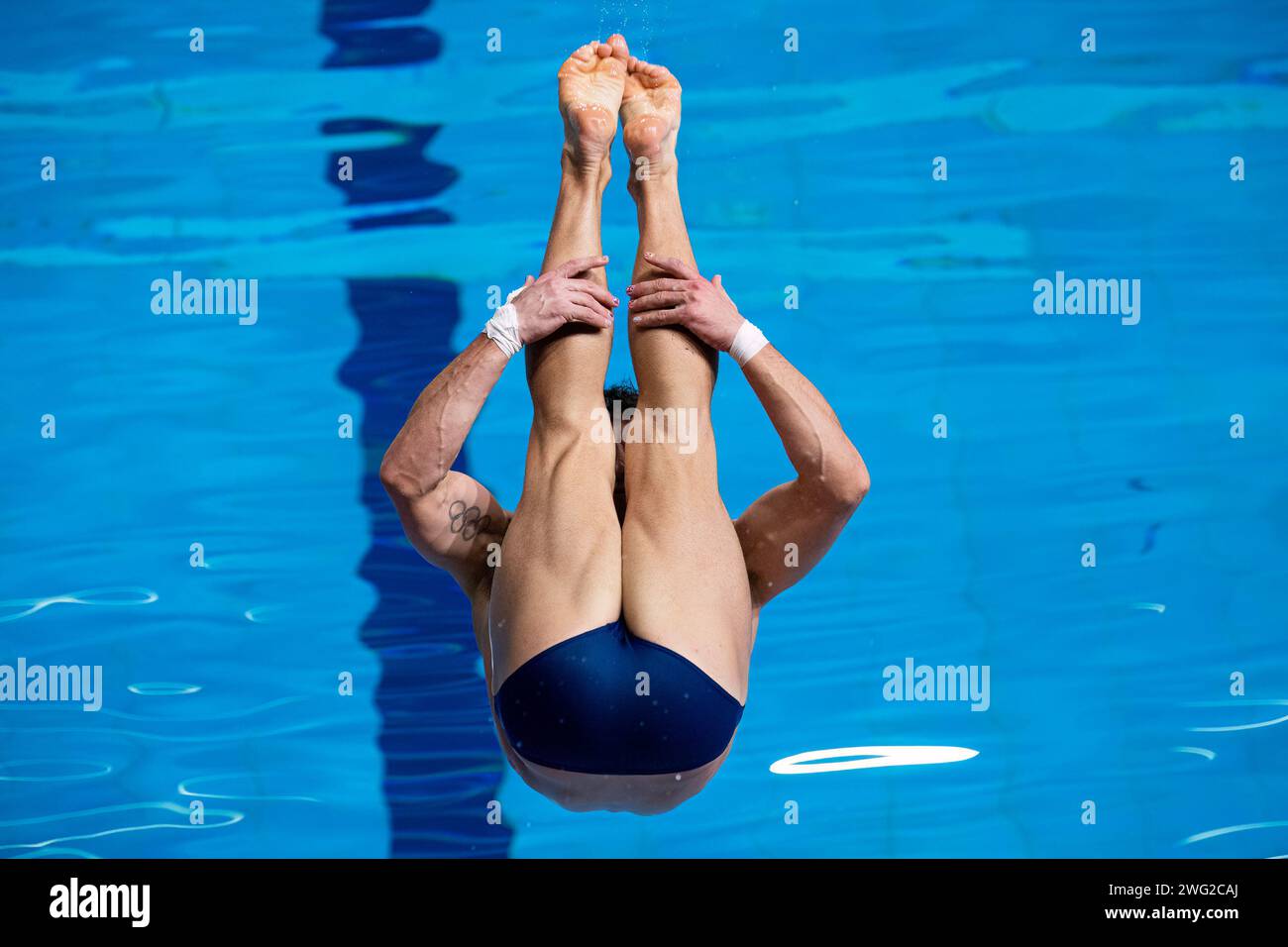 Tom Daley of Great Britain competes in the Mixed team event final