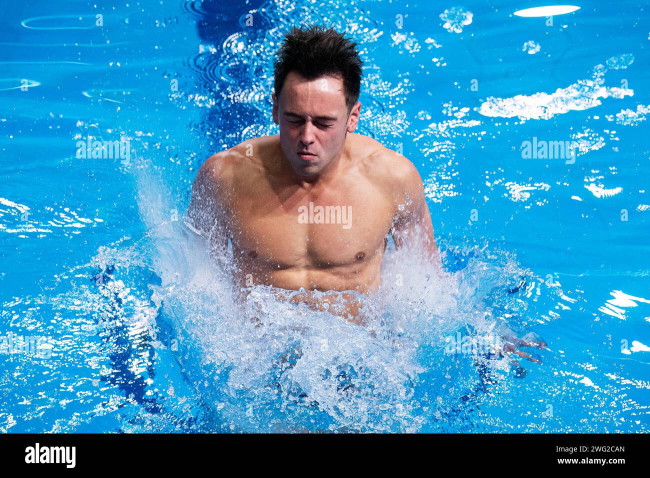 Tom Daley of Great Britain competes in the Mixed team event final