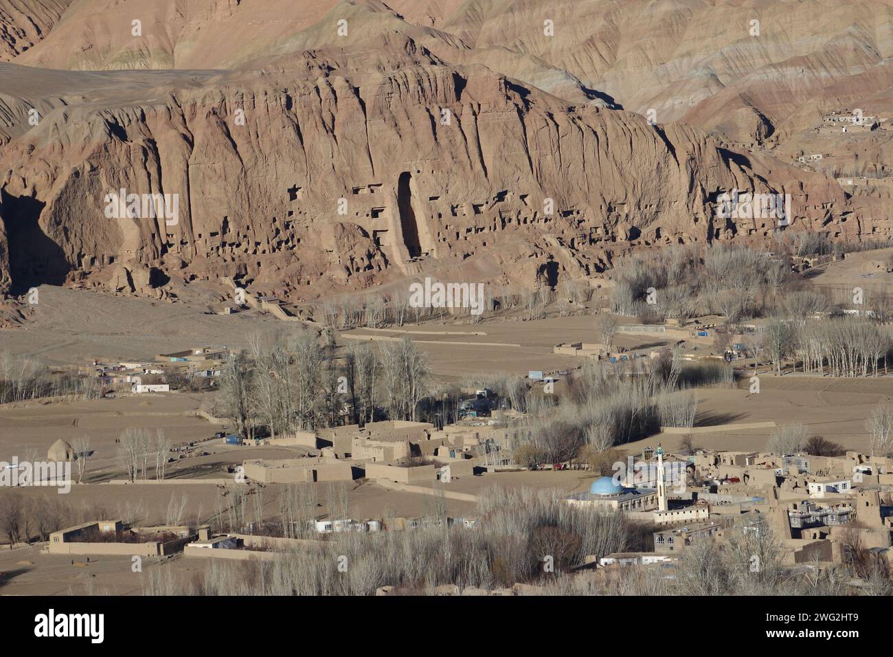The beautiful view of Bamiyan Valley with majestic rock formations and dry vegetation. Afghanistan Stock Photo