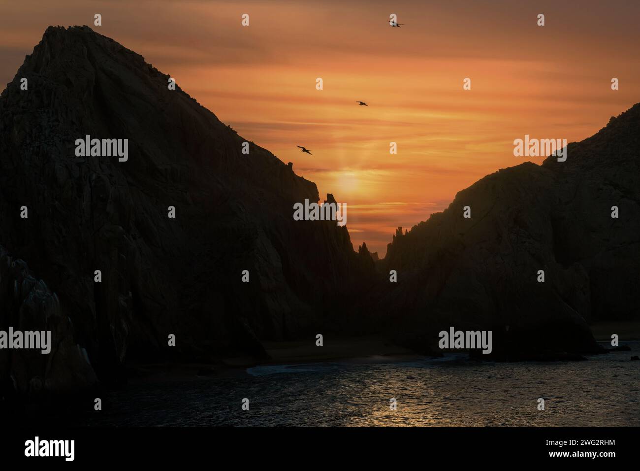 Land's End at Sunset, natural rock formation arch and the Sea Of Cortez. Stock Photo