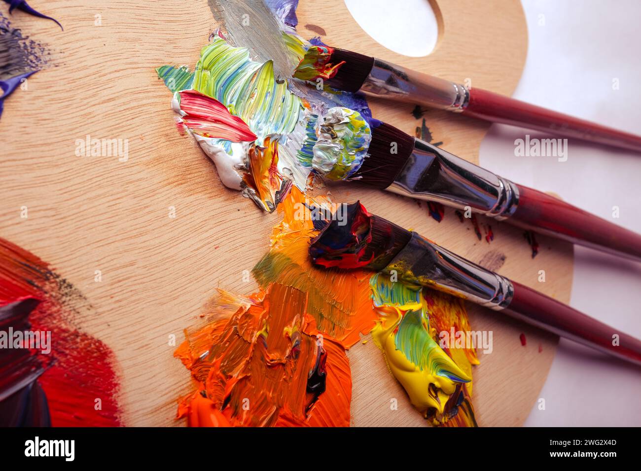 wooden pallete for mixing oil paints Stock Photo