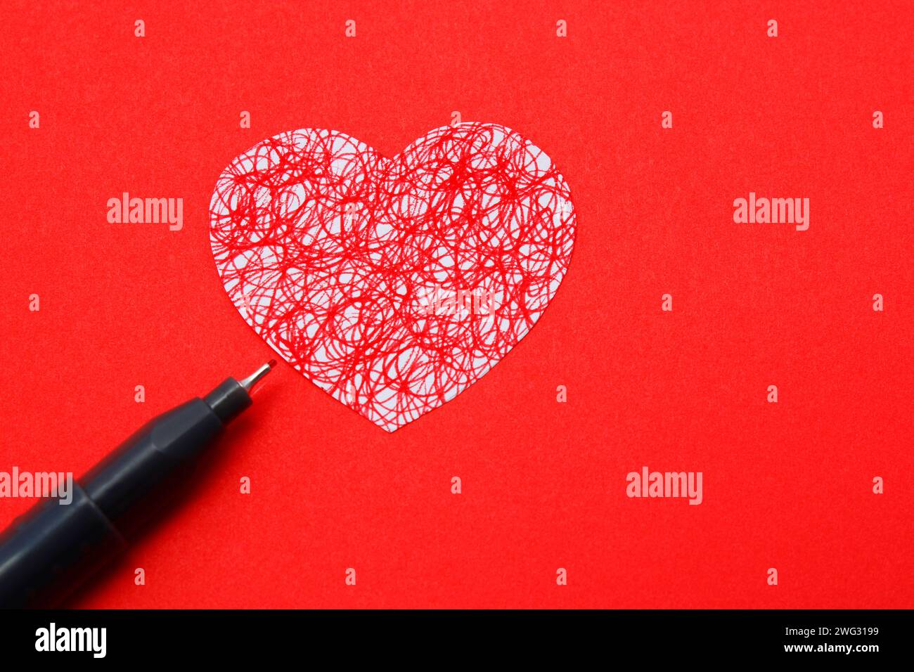 Drawing of a heart with a lot of disordered movement in its emotions Stock Photo