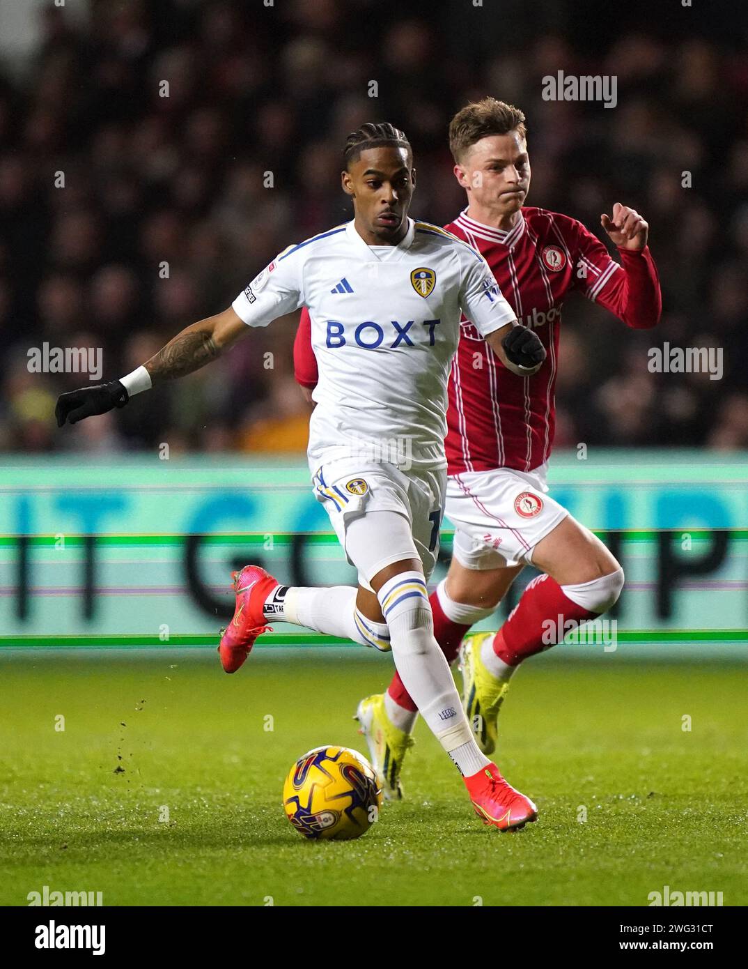 George Tanner Leeds United's Crysencio Summerville (left) and Bristol City's George ...