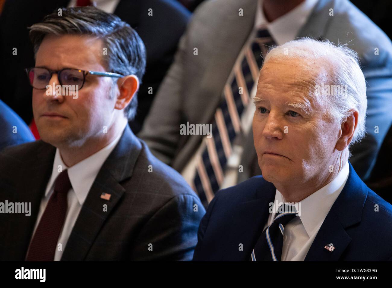 House Speaker Mike Johnson (R-La.) and President Joe Biden attend the ...