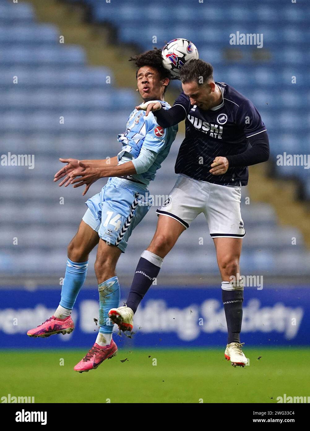 Coventry City's Joseph McCallum and Millwall's Alfie Massey battle for ...