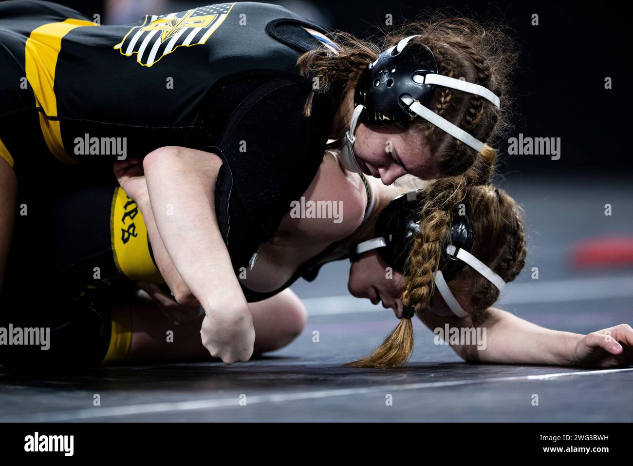 SigourneyKeota's Reanah Utterback wrestles VintonShellsburg's Ellie