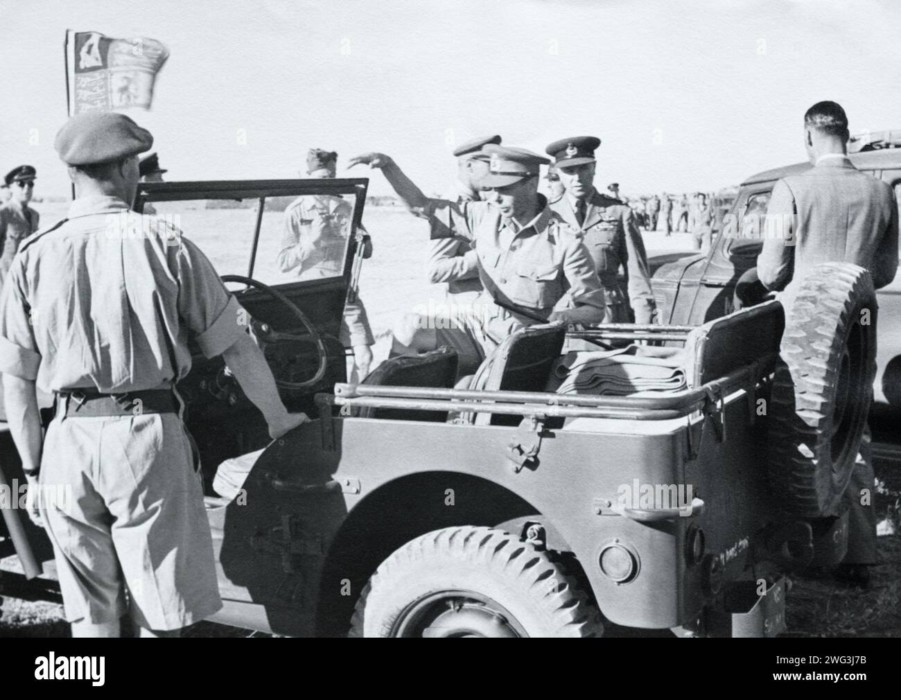 King George VI visting Allied troops in La Sebala Airfield, Tunsia, c. June 1943. Stock Photo