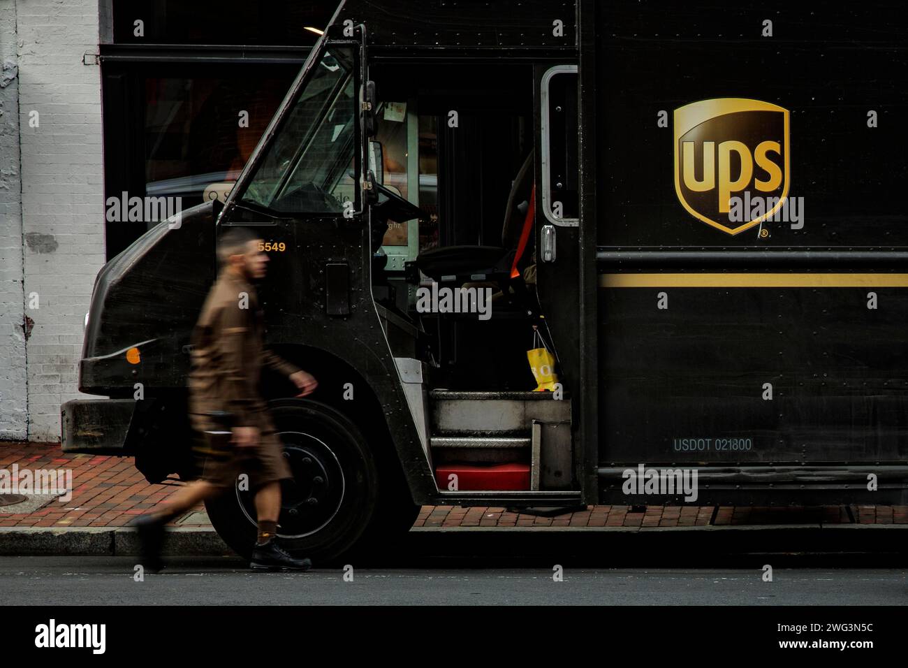 Washington, United States. 02nd Feb, 2024. A driver walks over to his