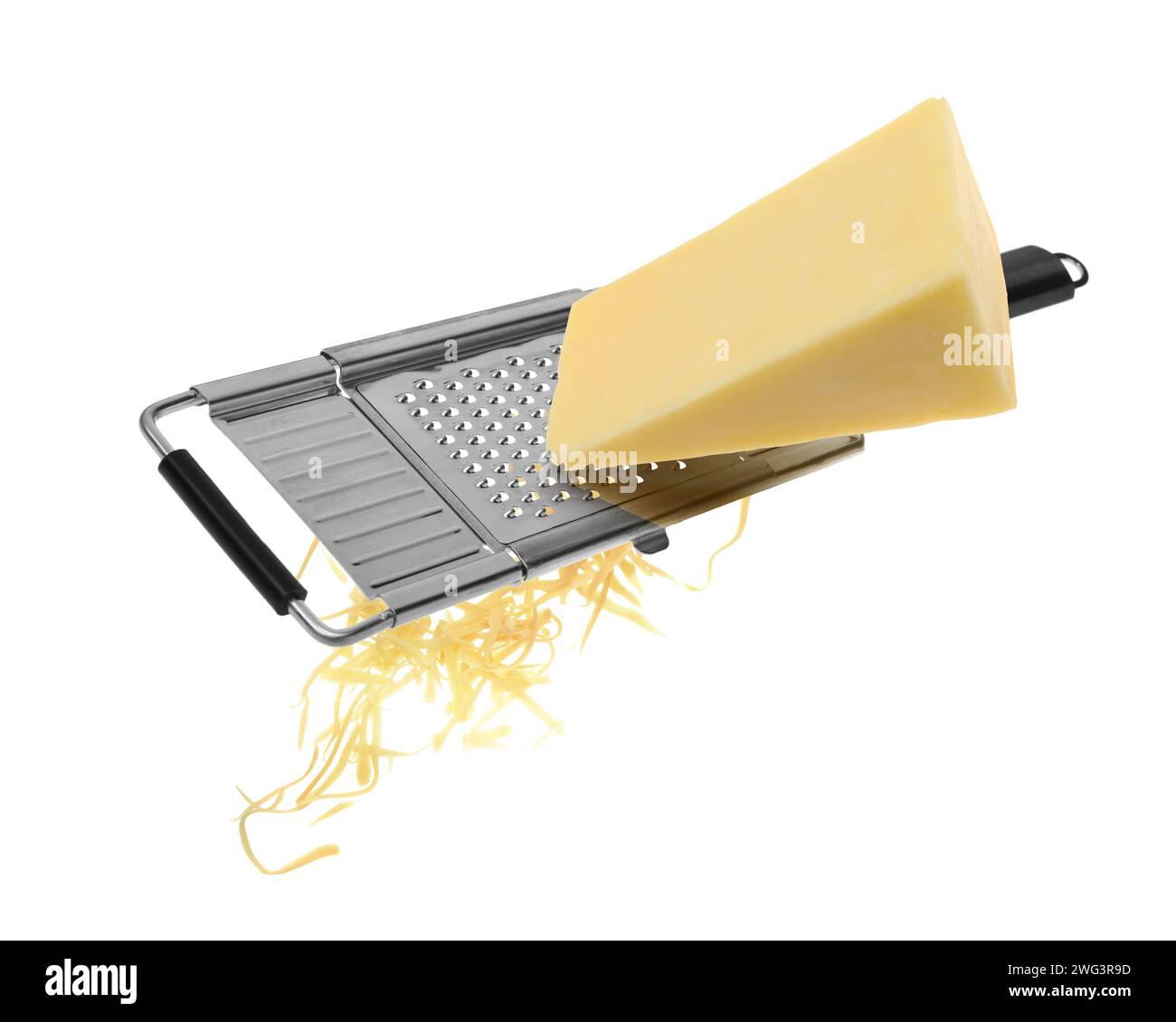 Grating cheese with hand grater in air on white background Stock Photo
